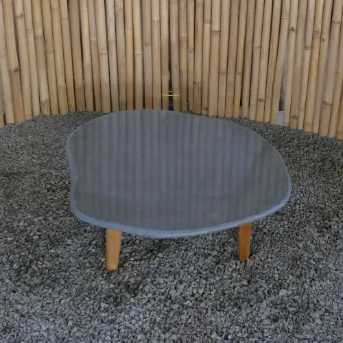 Product image of the product “Unique round flat Table, made from Riverstone slate with teak feet, approx dia. 80cm, 30cm height and 6cm thickness ”